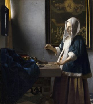 Woman Holding a Balance by Johannes Vermeer