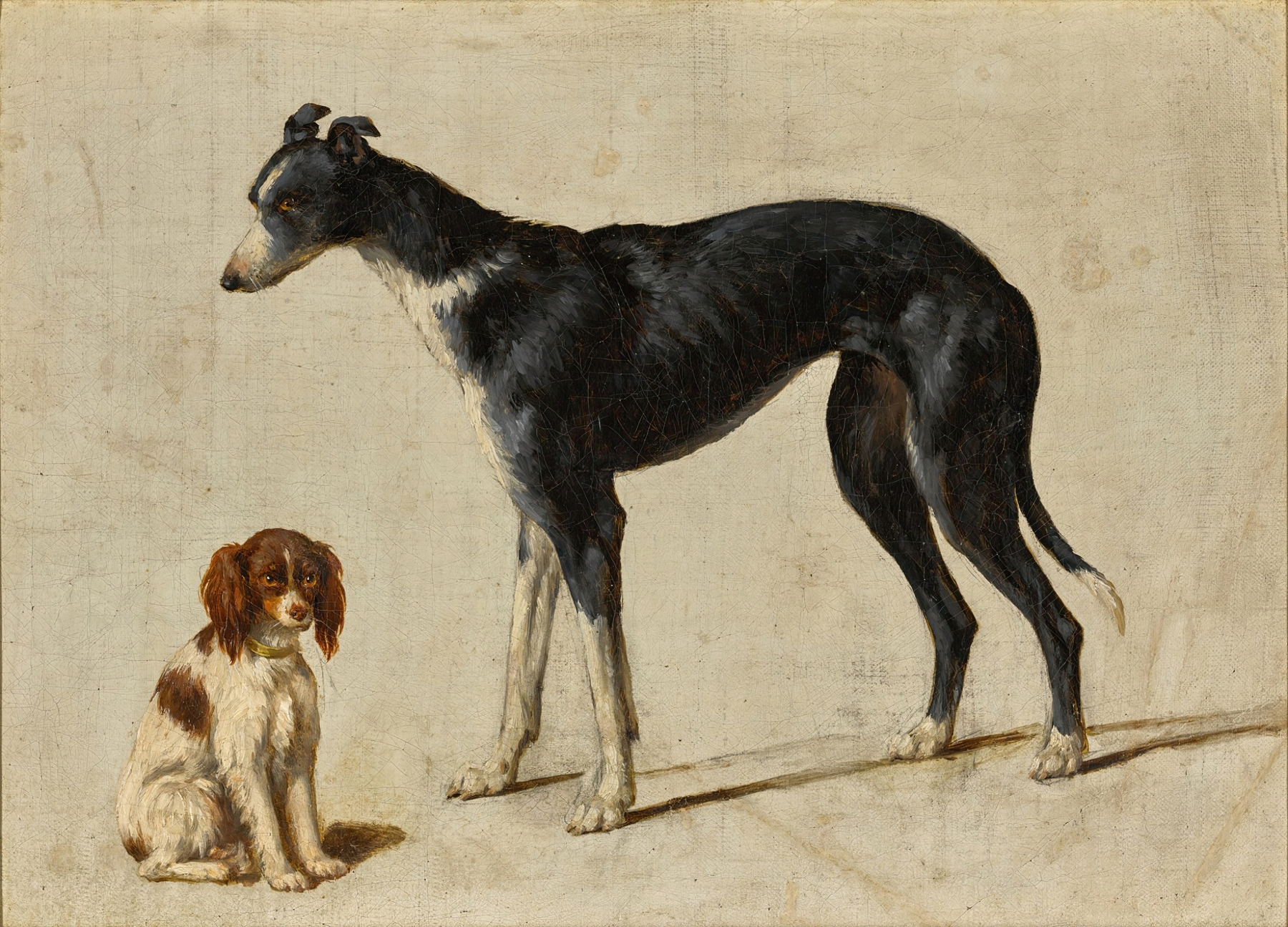 A seated Cavalier King Charles spaniel and a standing greyhound by Hendrik Stokvisch